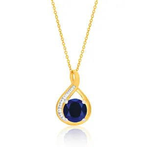 9ct Yellow Gold Created Blue Sapphire and Zirconia Pendant On 45cm Chain